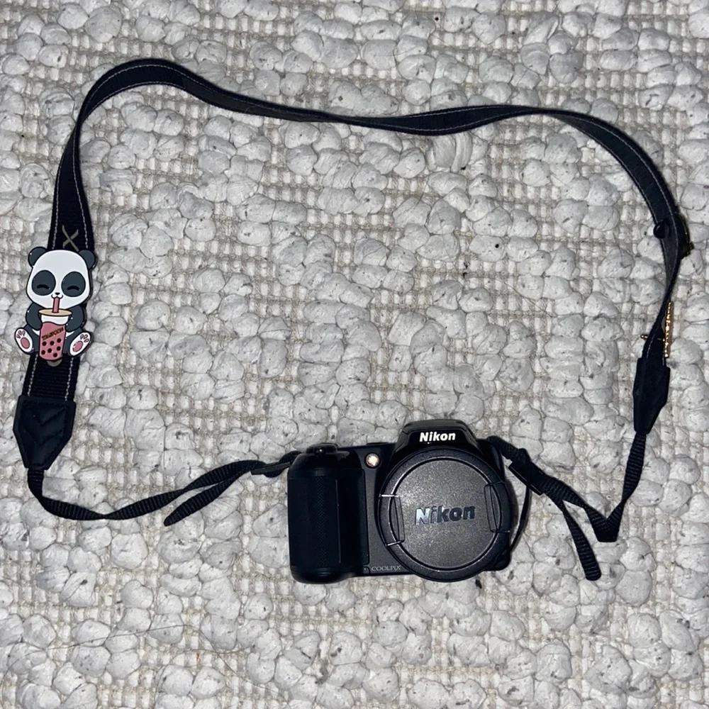 Black Nikon coolpix digital camera